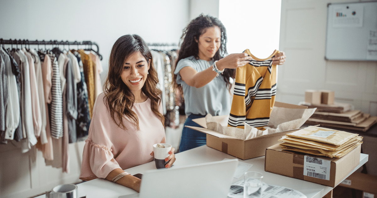 Women entrepreneurs managing business resources, showcasing smart financial strategies in a retail environment.