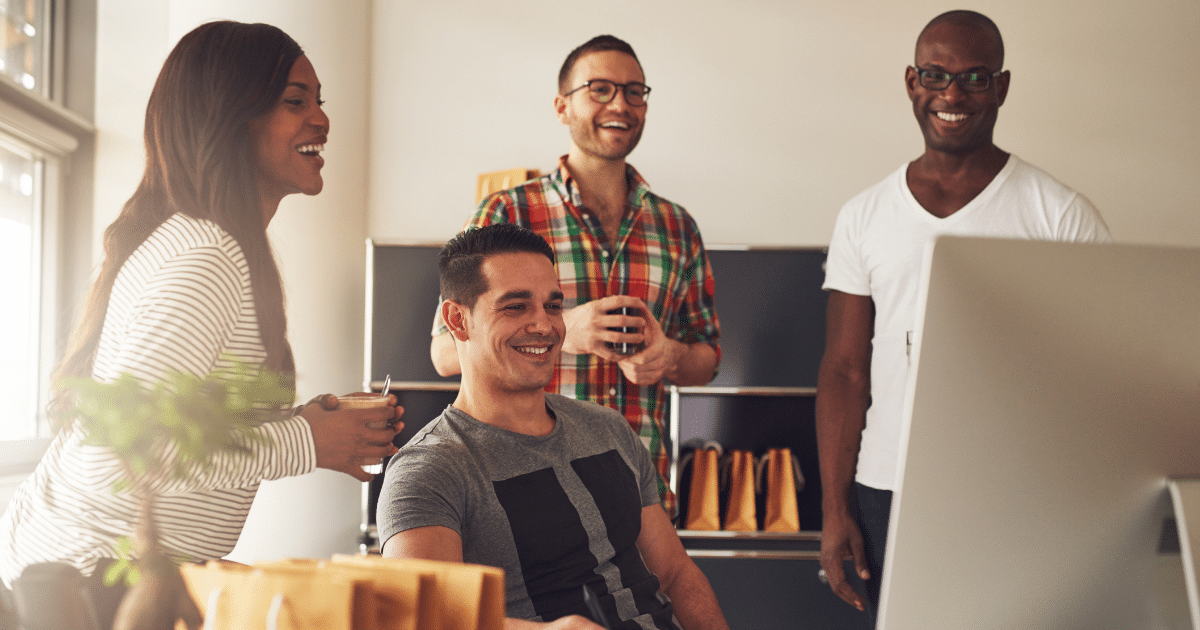 Diverse team collaborating and discussing business strategies for holiday season financial success.