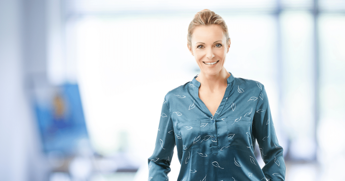 Professional woman in a safe office environment, promoting workplace safety and employee productivity.