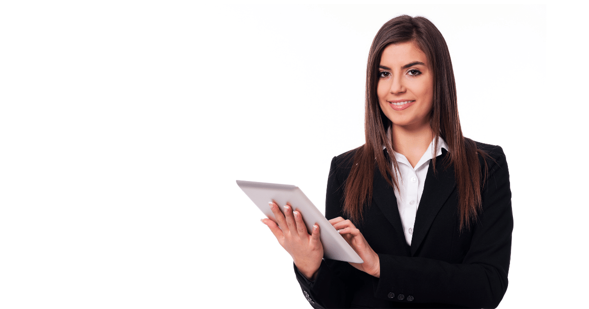 Professional woman in a suit holding a tablet, representing effective email marketing strategies for business engagement.