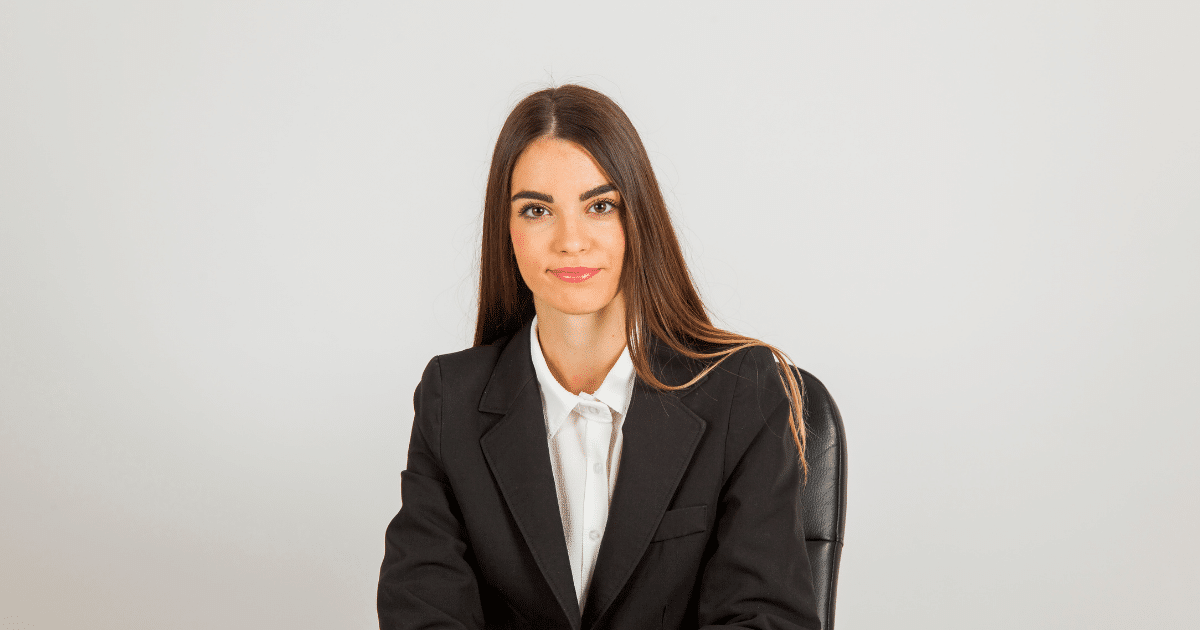 Professional woman in business attire, representing effective marketing strategies for business success.