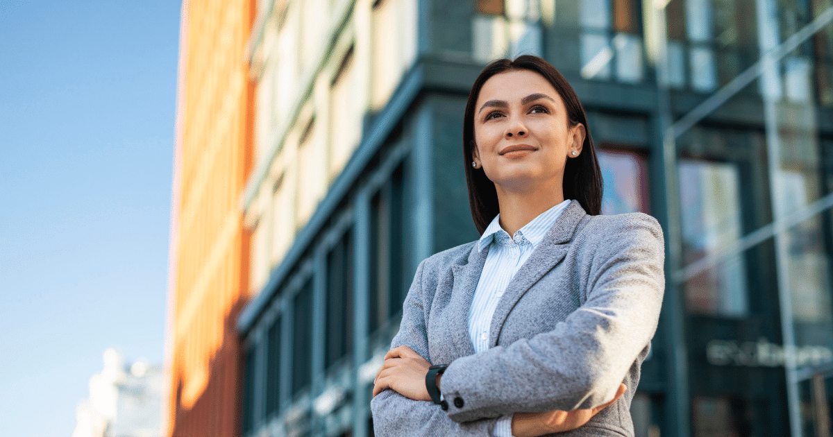 Business professional looking confidently towards the future, representing effective strategies for finding seasonal workers.