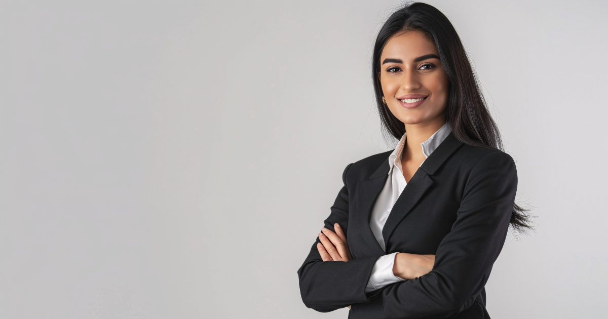 Professional woman in business attire promoting corporate social responsibility and community impact.