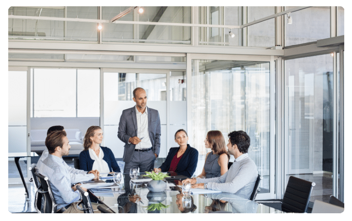 Business meeting focused on positive company culture and employee engagement strategies.