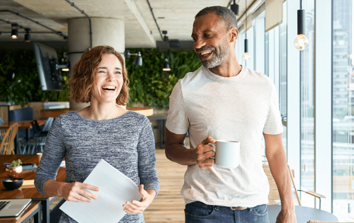 Business professionals discussing commercial loans and financing solutions in a modern office setting.