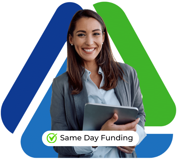 Business professional smiling with a tablet, promoting same day funding for debt consolidation loans.