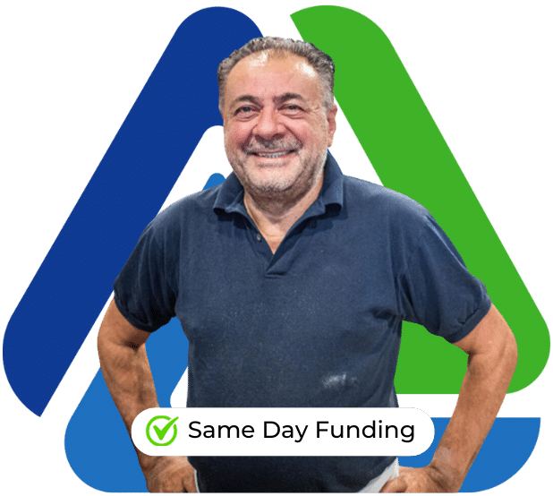 Smiling man promoting same day funding for merchant cash advances, emphasizing fast and flexible business financing solutions.
