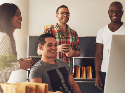 Diverse team collaborating and discussing business strategies for holiday season financial success.